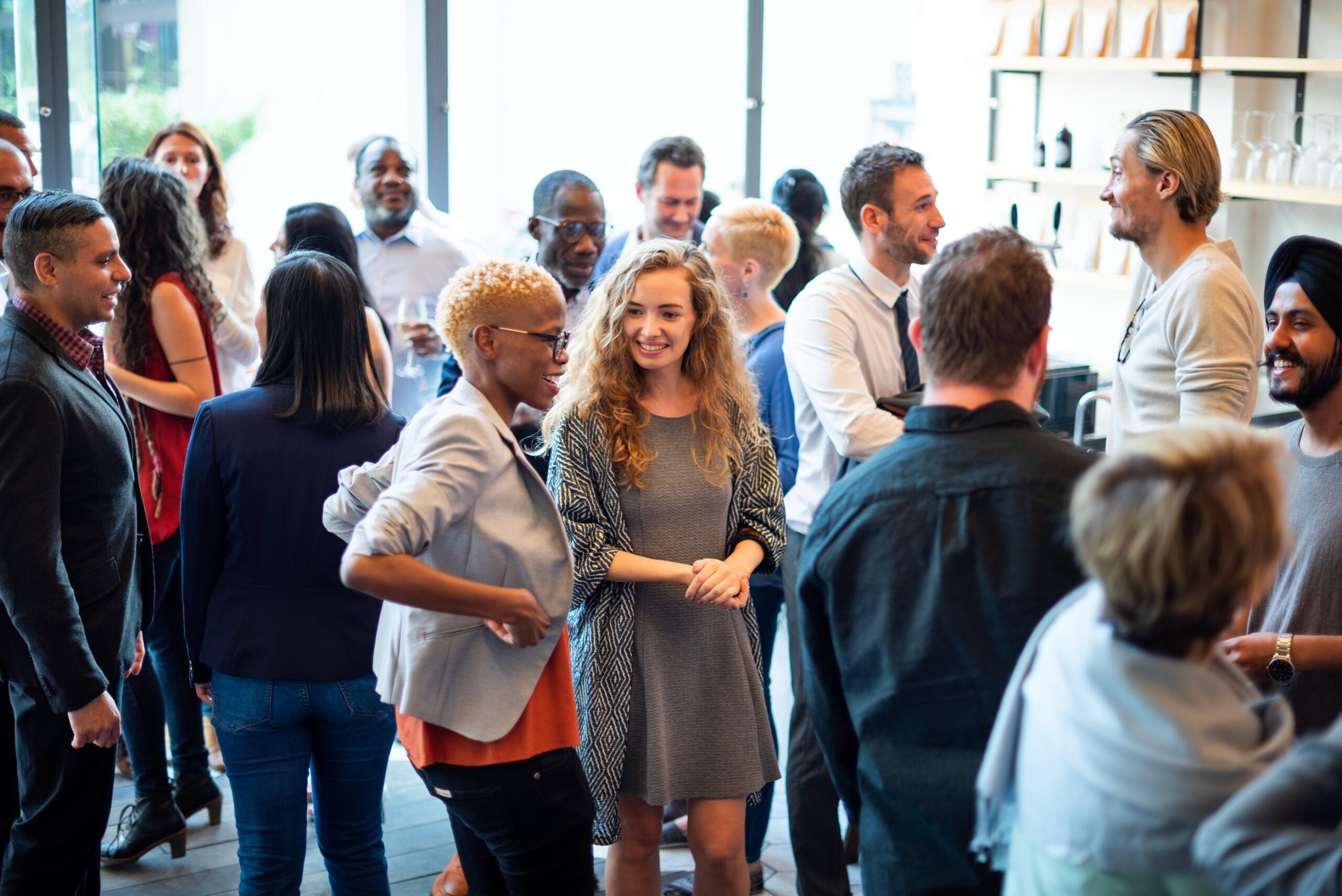 Diverse group socializing at a casual event.